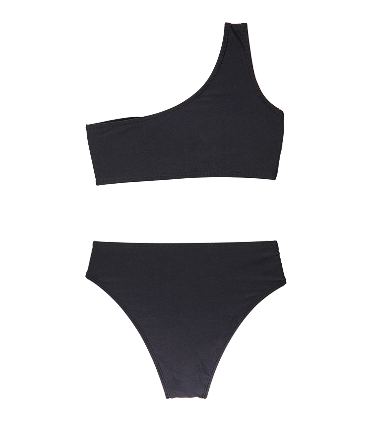 Enfärgad enaxelbikini med runda tillbehör